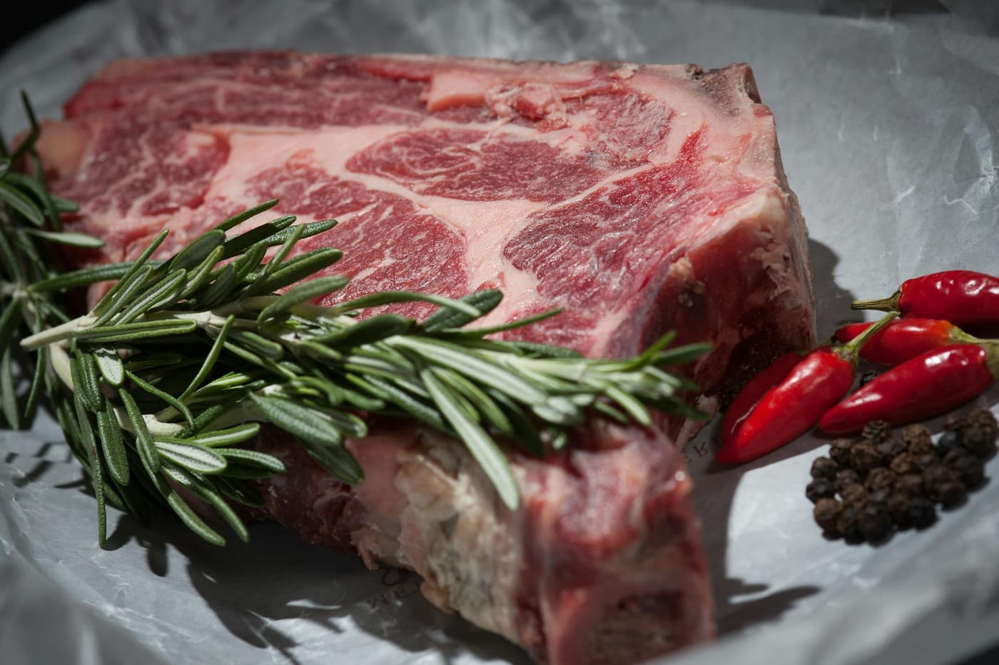 Cooked steak on a board, sliced